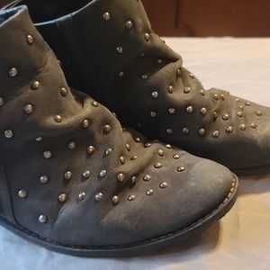 Black studded ankle booties from Urban Outfitters